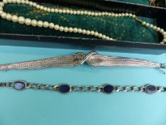 A collection of jewellery to include a Deco style silver bracelet with marcasite snake decoration,