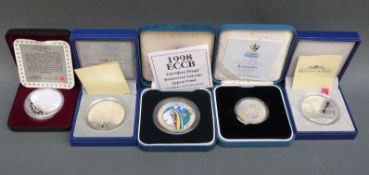 Five various cased and certificated silver coins to include 100 francs, 15 Euro Monuments of Europe,