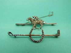 A silver brooch set with paste in the form of a horse and jockey and a silver brooch in the form of