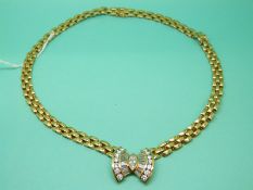 A Kutchinsky 18ct gold necklace set with a large marquise cut diamond,