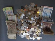 A collection of overseas coinage and banknotes includes a Napoleon III example and a cased silver