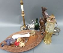 A collection of treen including trench art lamp, Marley horse, retro lamp, carved tray, bottle,