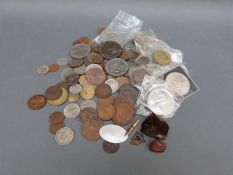 A quantity of UK and overseas sundry coinage George III onwards, together with two nuggets of amber,