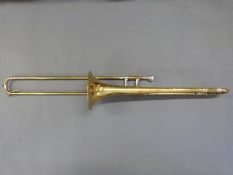 A cased Boosey and Hawkes trombone