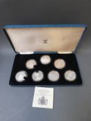 A boxed set of seven Queen Elizabeth The Queen Mother 80th birthday proof commemorative crowns