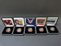 Five cased silver proof £2 coins with certificates to include Steam Locomotive and WWII