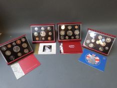 Four Royal Mint UK proof coin collections 2001-2004 with certificates