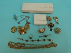 A collection of brooches to include Sarah Coventry,