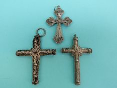 Three white metal filigree cross pendants