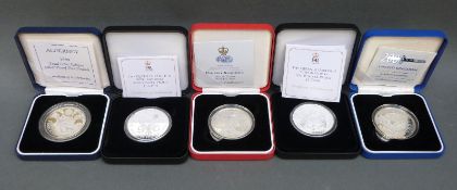 Five cased and certificated silver proof £5 commemorative coins including Total Eclipse of the Sun,