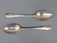 A pair of Georgian bottom hallmarked silver table spoons,