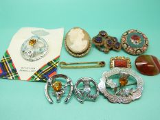 A collection of brooches including agate, cameo, Victorian set with amethysts,