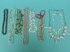 Eight pearl necklaces including a large single strand of Tahitian cultured pearls,