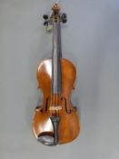 A late 19th/20th century anonymous violin with 34cm two piece back
