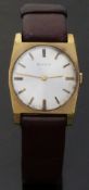 Bulova gold plated gentleman's wristwatch with gold hands and two tone baton numerals,
