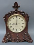 Chas Desprex Bristol bracket clock, the carved oak case with foliate decoration,