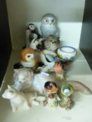 A collection of cat and bird figures including Beswick,