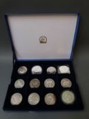 Twelve various crowns and crown sized coins to include some silver, 1937 Southern Rhodesia,