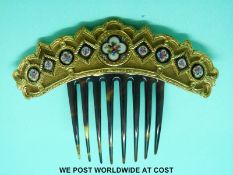 A comb decorated with very fine floral enamel panels,