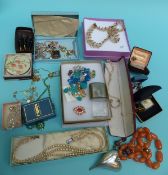 A collection of costume jewellery to include necklaces, brooches,