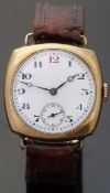 A cushion shaped gentleman's 9ct gold wristwatch with inset subsidiary seconds dial,
