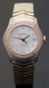 Ebel Classic ladies wristwatch with date aperture, gold hands,
