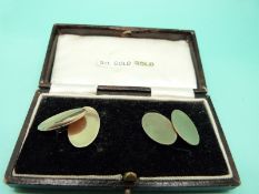 A pair of 9ct gold cufflinks in original box, 6.4g.
