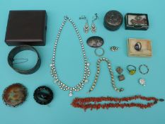 A Ruskin brooch, silver rings, jet brooch, silver bangle,