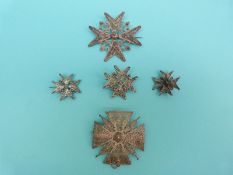 Five white metal filigree brooches each in the form of a Maltese cross,