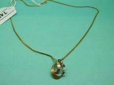A 9ct gold necklace set with sapphires and diamonds, weight 6.
