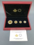 A 2016 pure gold Maple Leaf fractional set in deluxe case with certificate