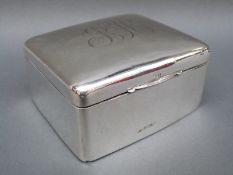A hallmarked silver cigarette box, Birmingham 1919,