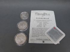 Two Canada silver dollars 1994 and 1995 together with a USA D-Day dollar 1995