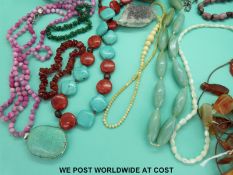 A large white metal locket with embossed Middle Eastern design, agate,