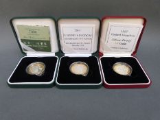 Three cased and certificated silver proof £2 1997,