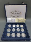 A coin case containing 12 Royal commemorative silver coins, some with certificates,
