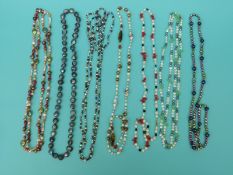 Seven pearl necklaces including freshwater in different colours,
