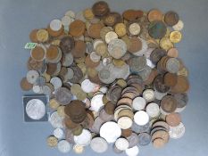 A collection of UK and overseas coinage, includes George III 1772 1/2 d,