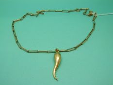 A 9ct gold necklace made up of elongated links with teardrop pendant and miniature 9ct gold charm,