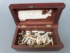 A 19thC mahogany ballot box with pens and clay pipes for voting,