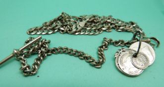 A silver necklace etc.