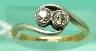 An 18ct gold ring set with two diamonds in a platinum setting with receipt from 1923 (Size K)