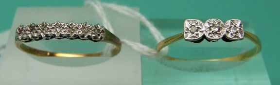 A 9ct gold ring set with diamonds and a 14ct gold ring set with diamonds (Size U)