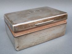 A hallmarked silver cigarette case with engine turned lid, London 1931,
