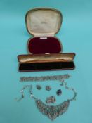 A silver necklace set with marcasite, marcastite earrings and bracelet,