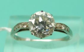 A platinum ring set with solitaire diamond of approximately 1.