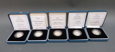 Five cased 1997-1999 silver proof one pound coins with certificates
