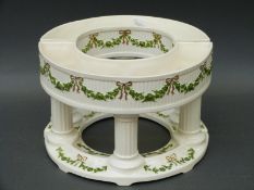 A pair of German porcelain semi-circular bough pots