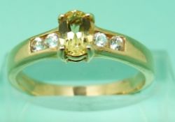 Three 9ct gold rings set with yellow stones
