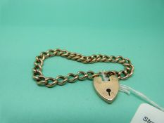 A 9ct rose gold curb link bracelet with a 9ct gold padlock clasp, 9.